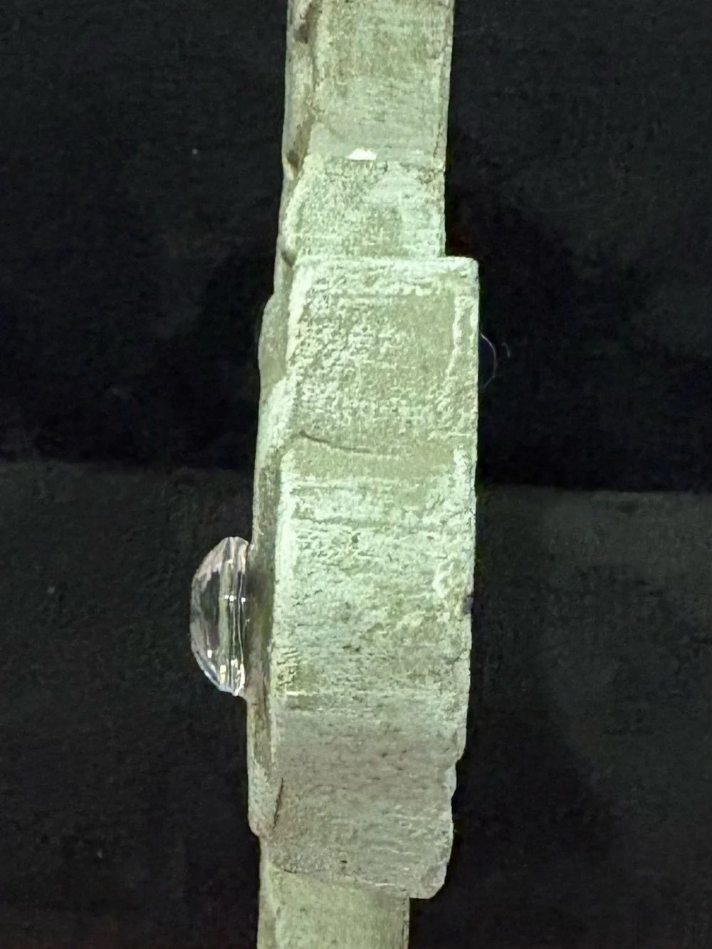 Ornate grey stone-look wall cross